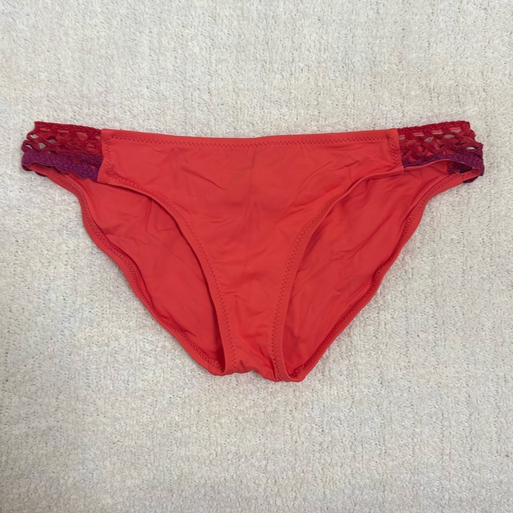 BECCA orange swimsuit bikini bottoms with crochet sides, never worn, size large